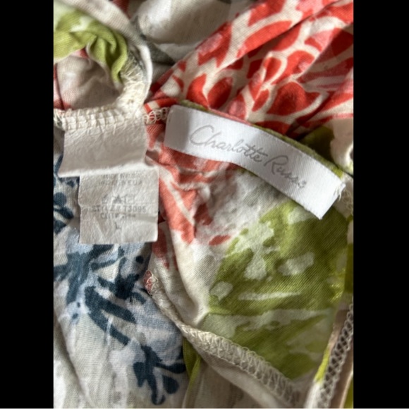 It is a Charlotte Russe floral short sleeve top in a size large - Picture 3 of 4